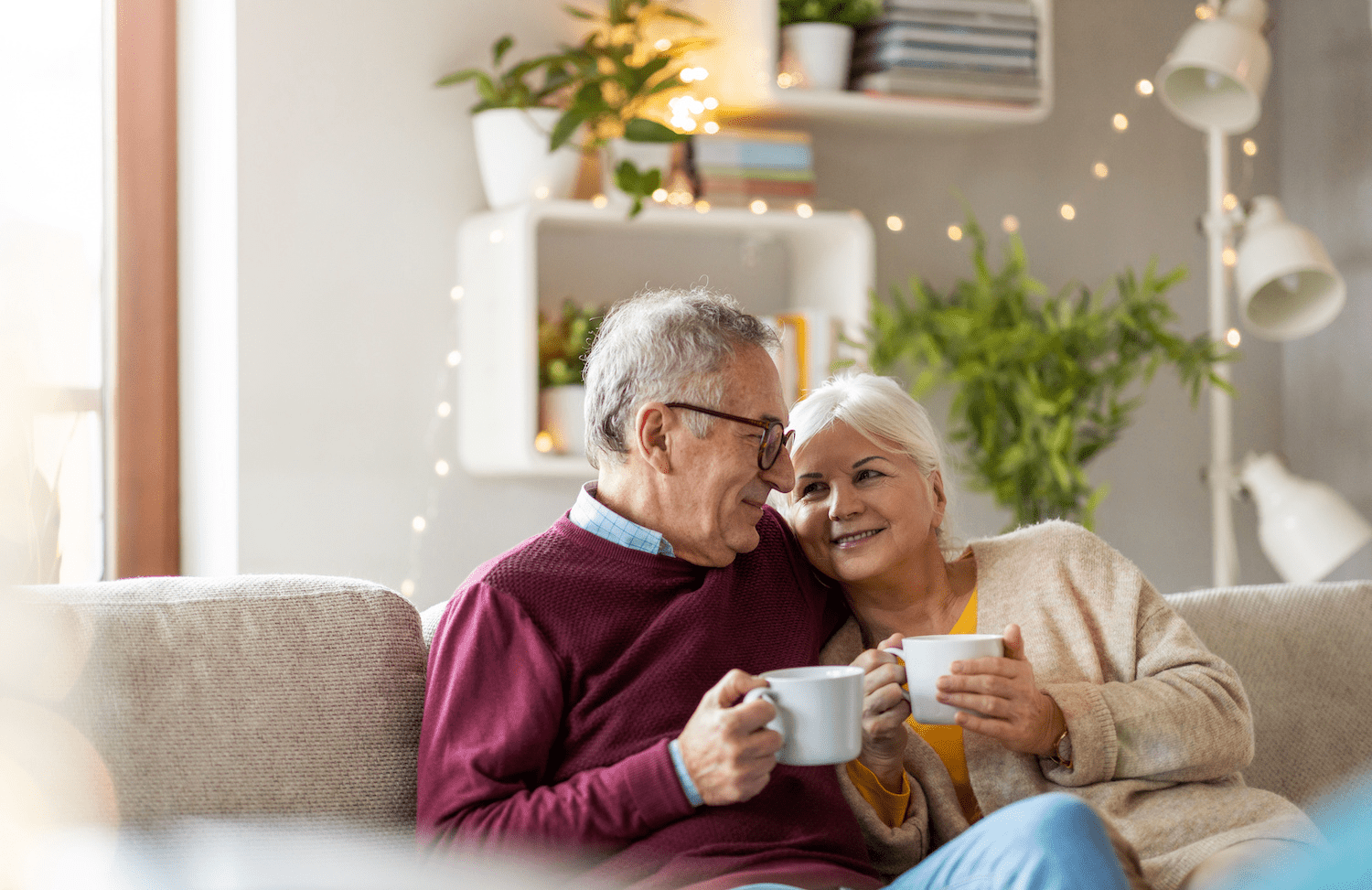 elderly couple on couch