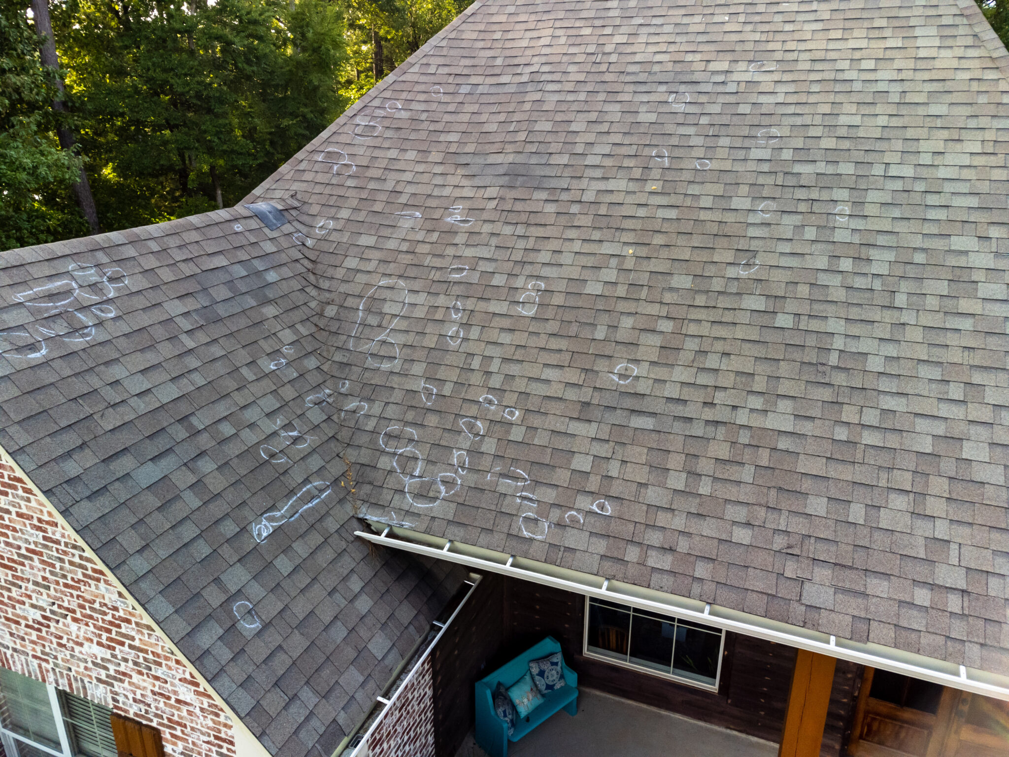 How Much Hail Damage to Replace Roof in 2023 [Guide]