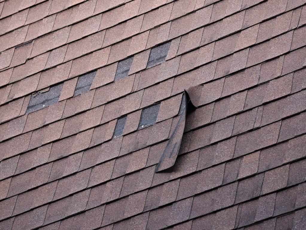wind damage inspections missing shingles on roof