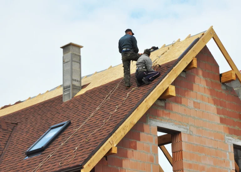 roofing contractors hired to tear off and replace shingle roof