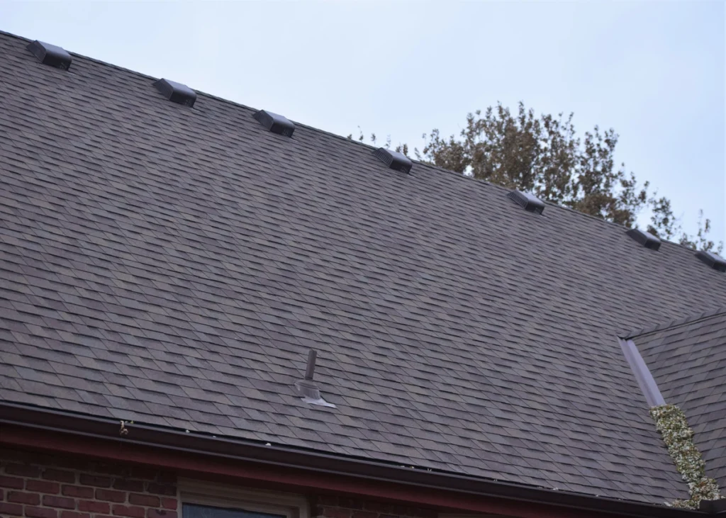 side view of a steep roof with asphalt shingles