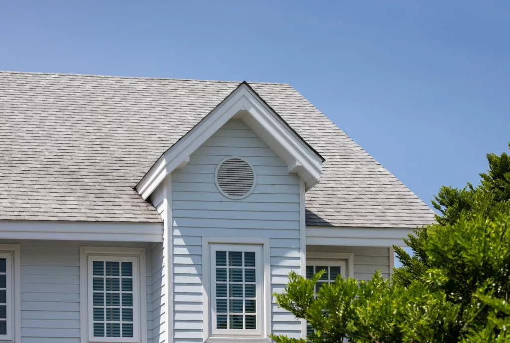 This image has an empty alt attribute; its file name is gray-asphalt-shingles-on-roof-1024x689.webp