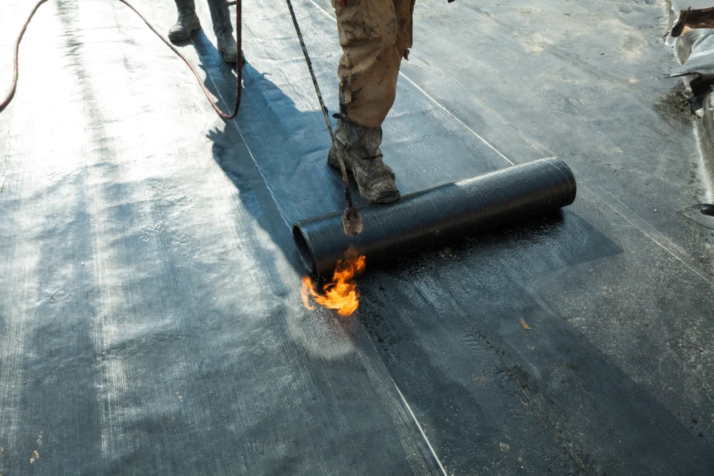 installing roll roofing 