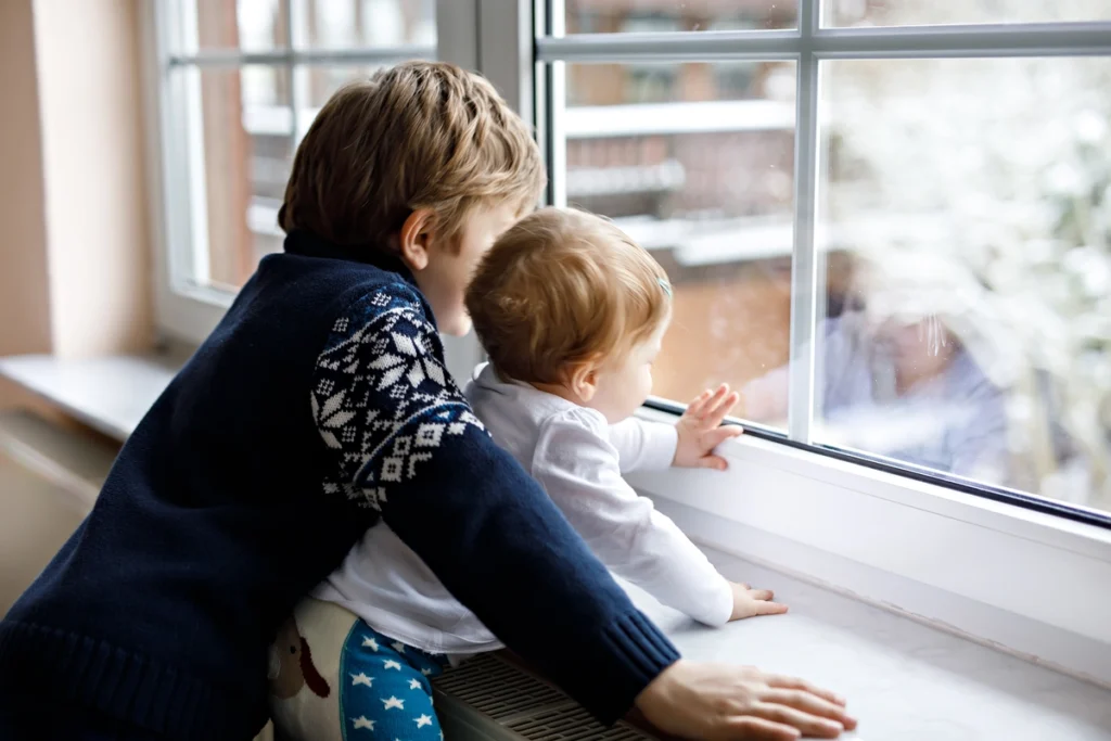 looking out windows at snow