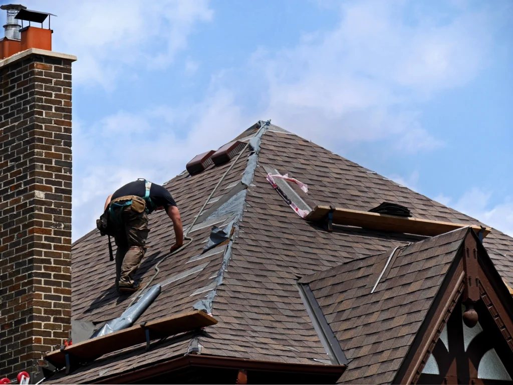 roofer replacing a roof