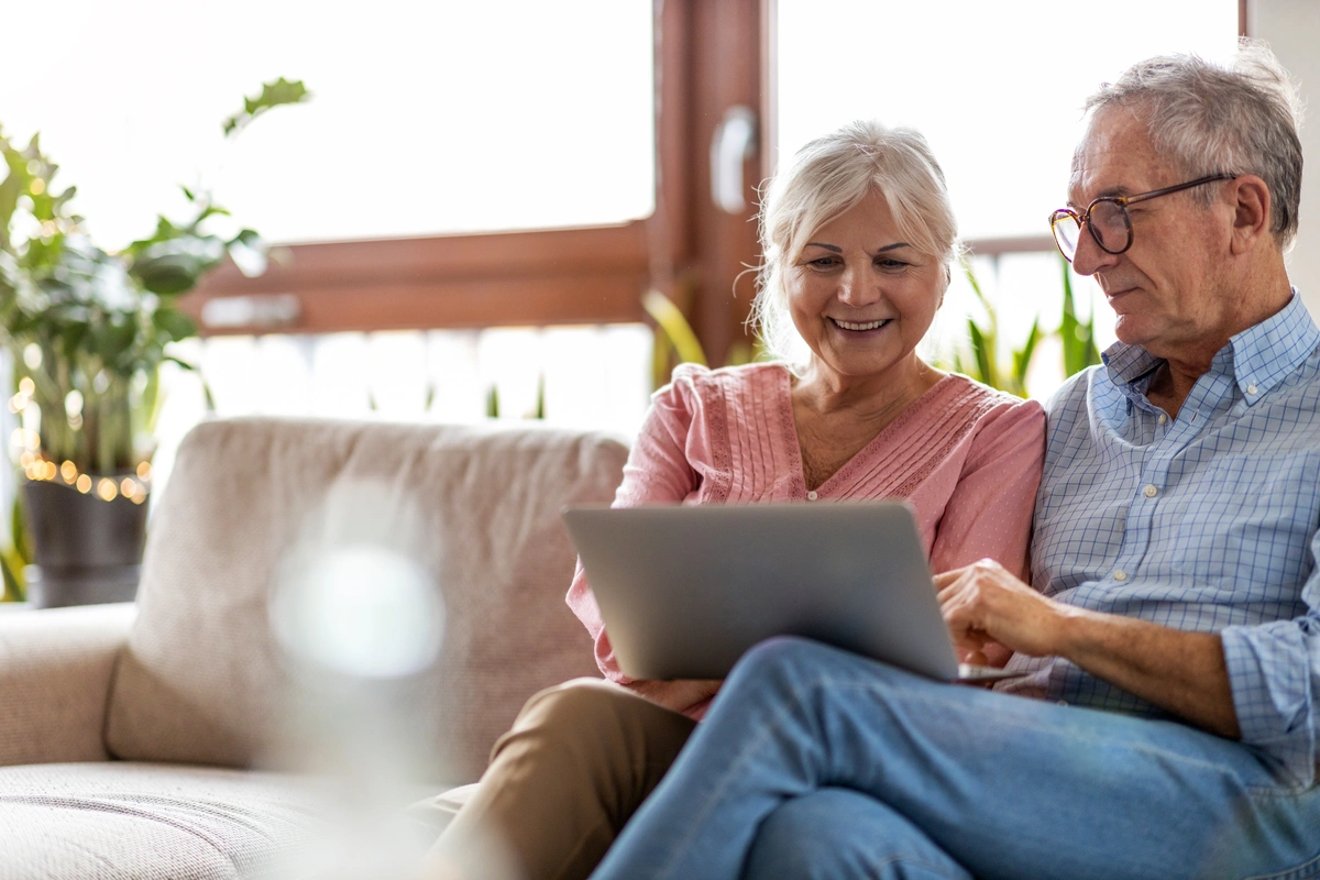 elderly couple looking at laptop-sugarcreek oh