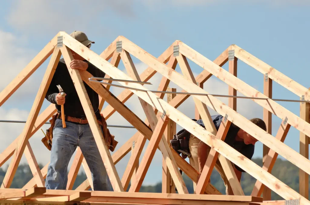 two roofers and trusses