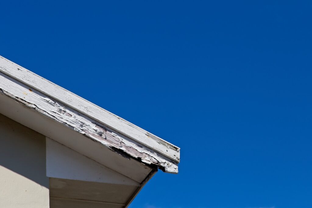 fascia board damaged and rotting on residential house