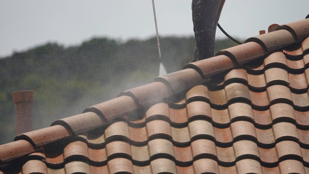 Pressure washing tile roofing