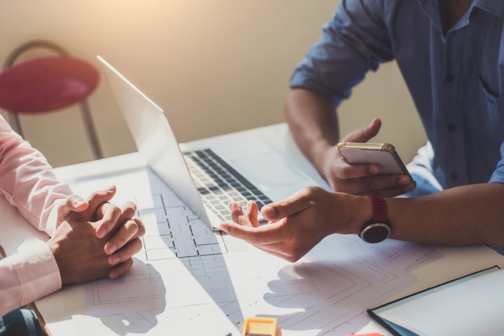 meeting with a contractor to discuss projects and warranty options