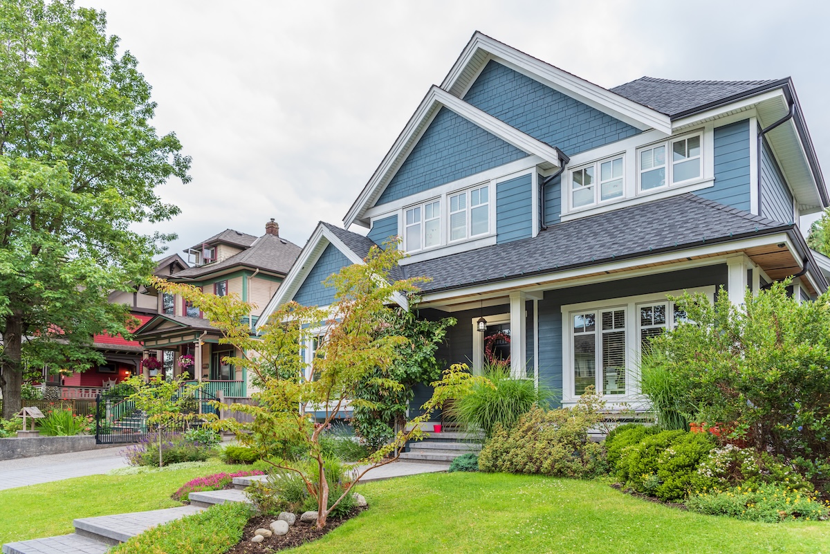 Blue shake and vinyl siding in the suburbs