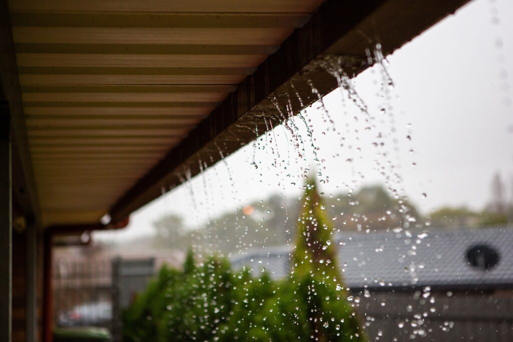 Overflowing house gutters