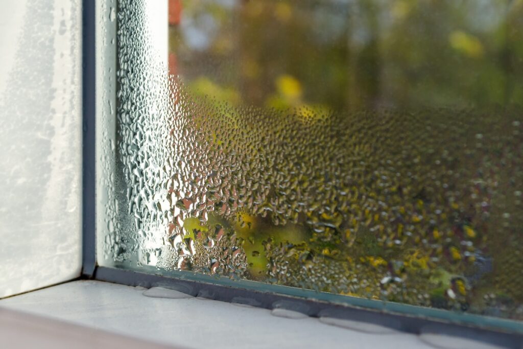 window with water drops closeup, frame inside, selective focus