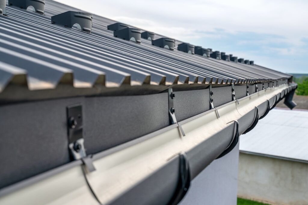 Gutter system for a metal roof.