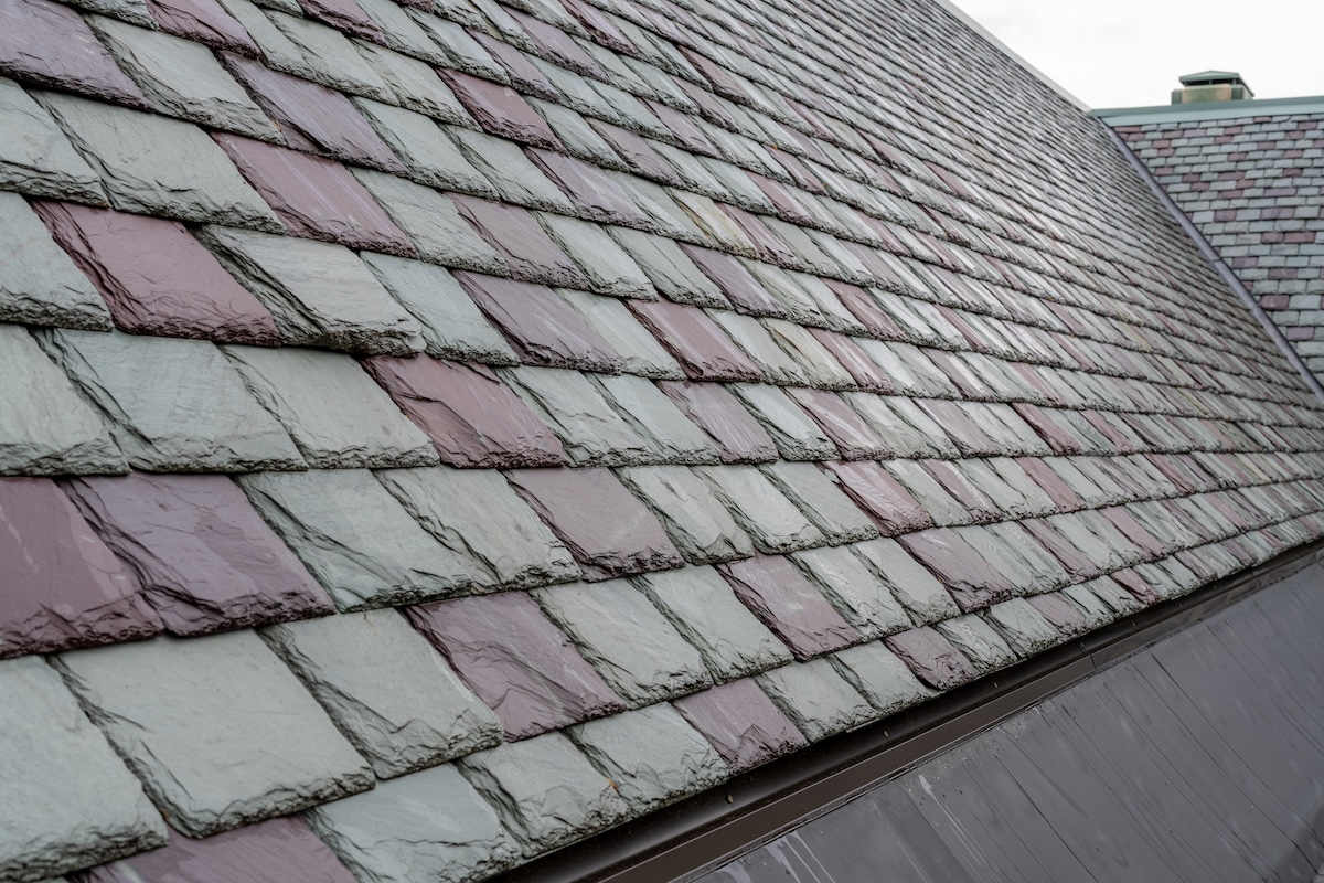 Slate roofing tiles on a historic building. Attractive, durable roofing material.