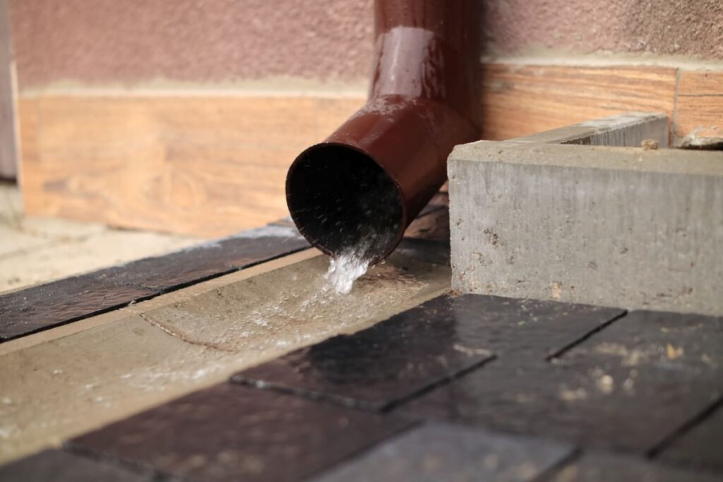 water coming out from downspout