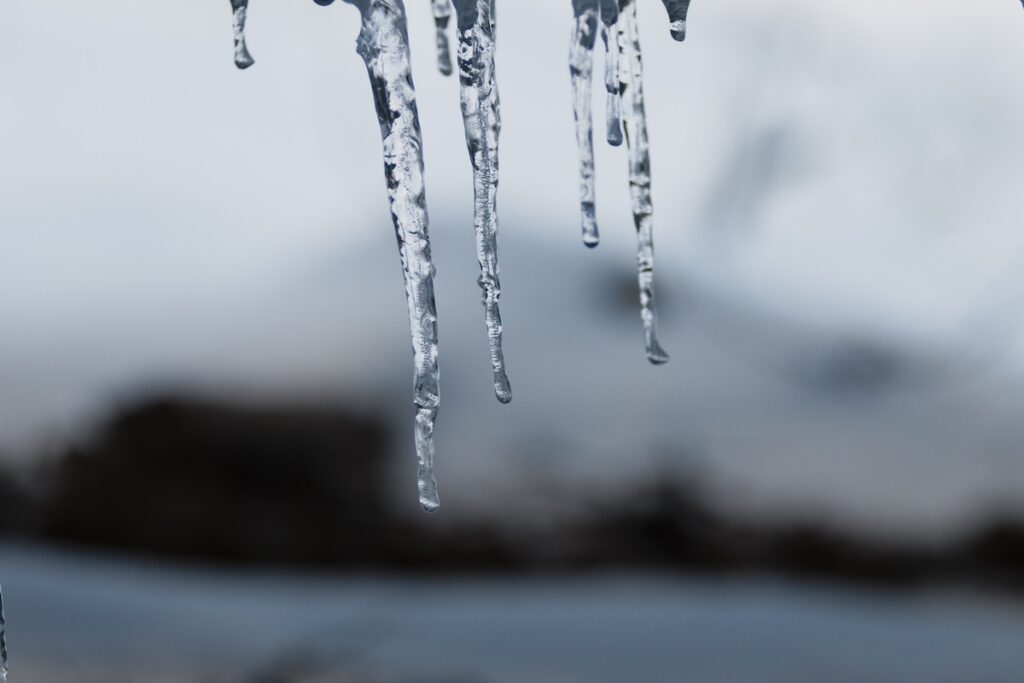 icicles hanging from a roof