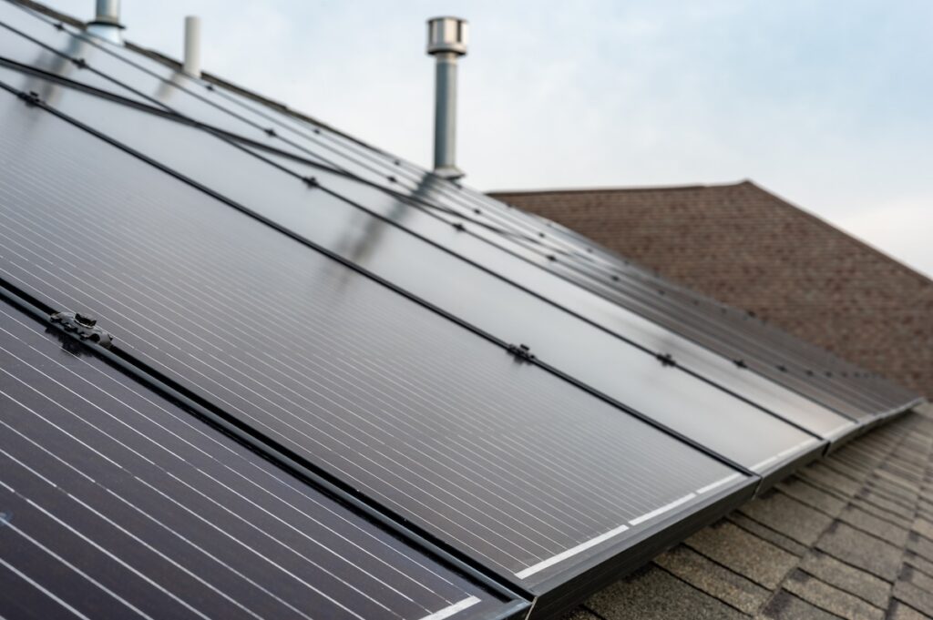 Solar installation on a residential asphalt shingle roof