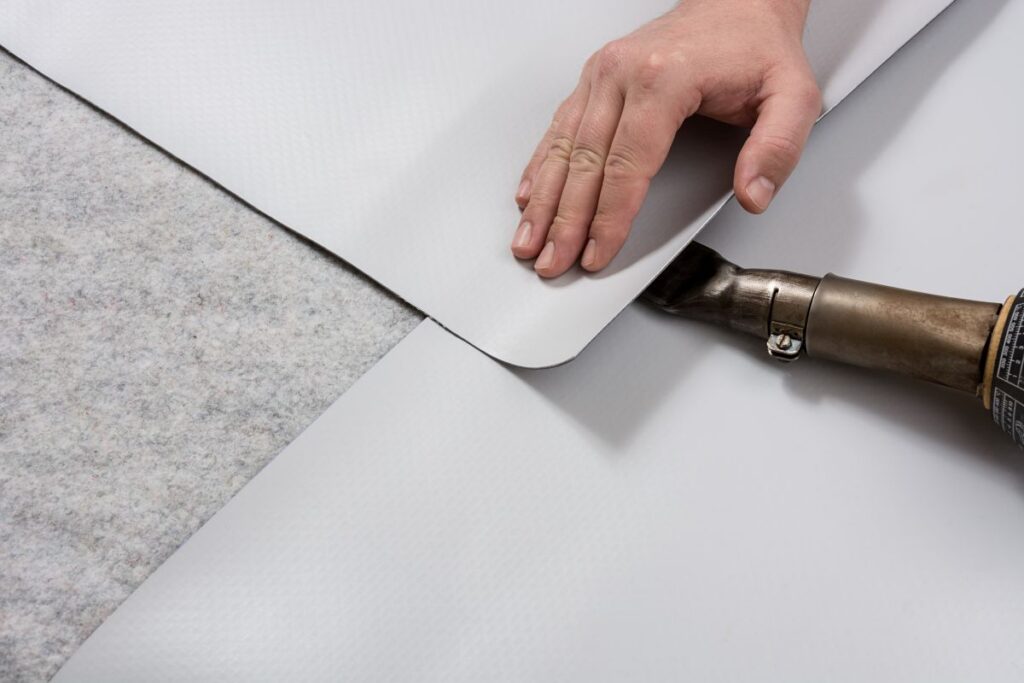 commercial roof leak repair TPO and heat gun