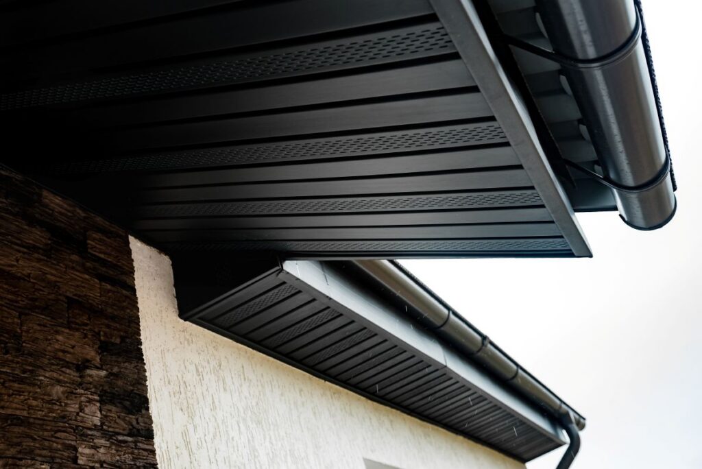 black soffit repair white wall big house plastic gutter system