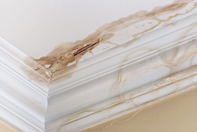 ceiling water damage repair yellow stains on wall