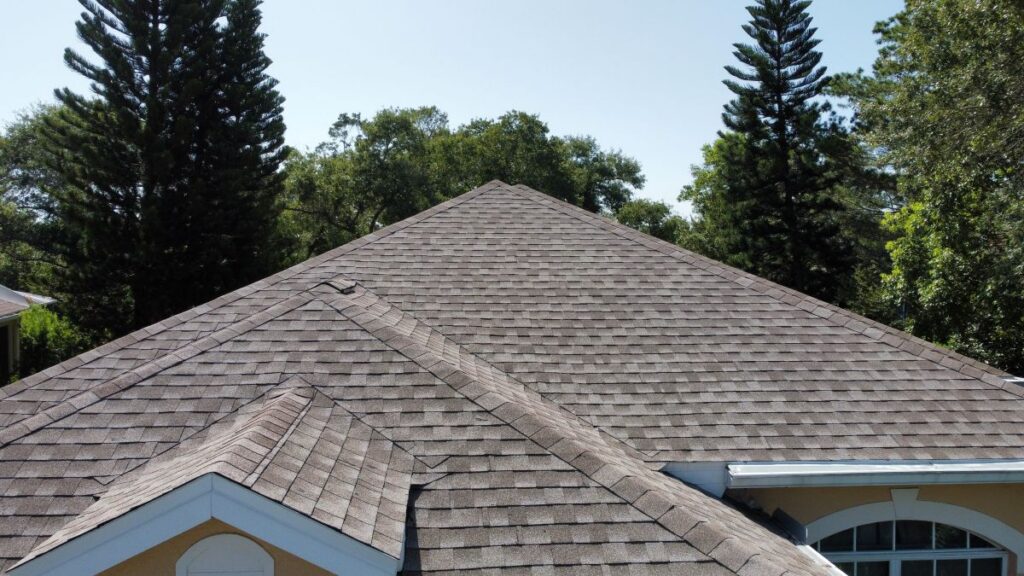 how long do asphalt shingles last grey and brown rood summer time