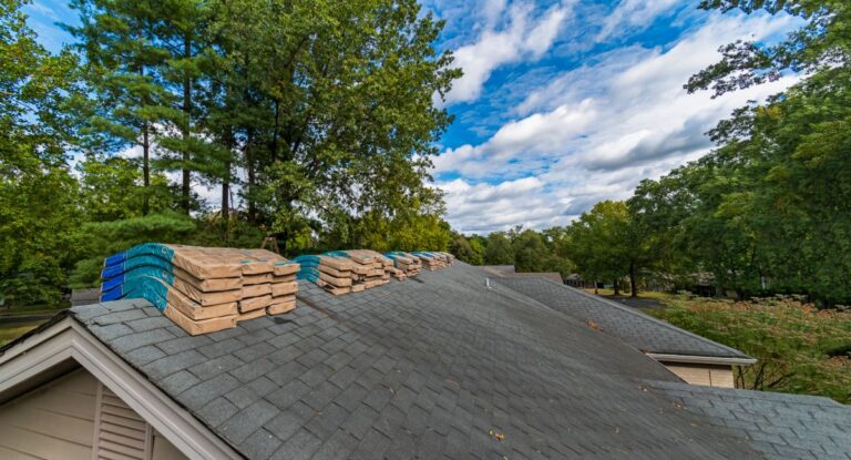 how much does a new roof cost old shingles material on top of roof