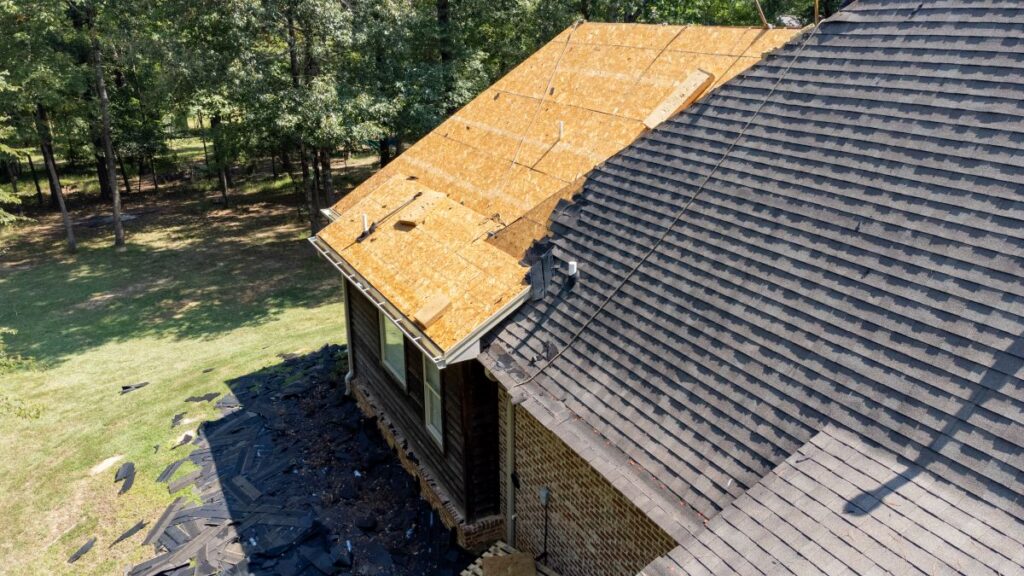 how much does a new roof cost wooden panels and old shingles replacement