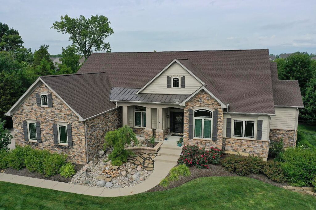 residential home with a shingle roof