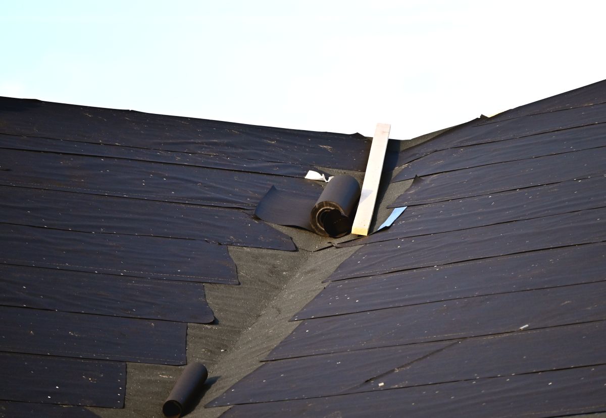 roof underlayment being installed