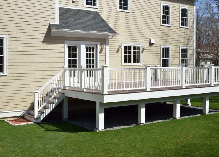 what is composite siding yellow siding white fence
