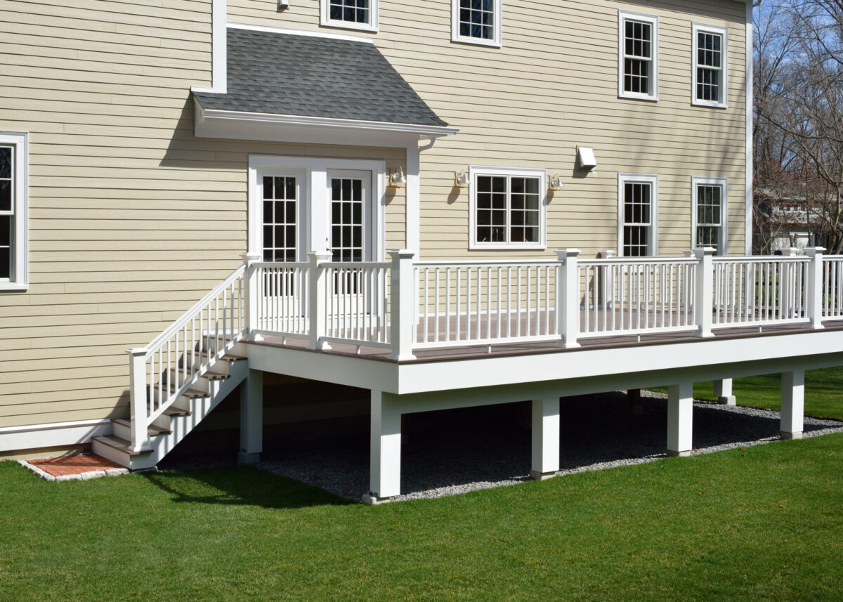 what is composite siding yellow siding white fence