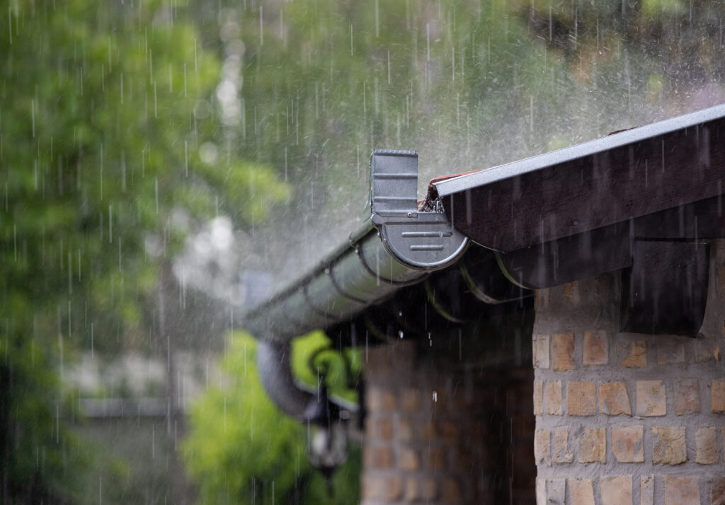 Hevy rain on roof and gutter