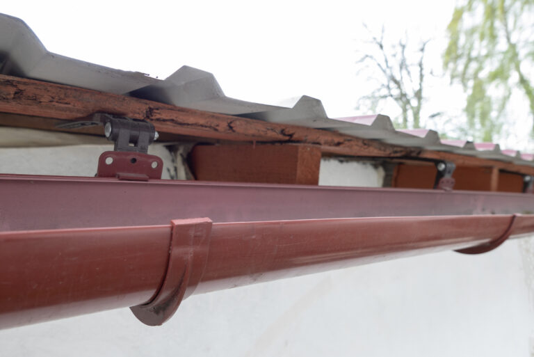k style vs half round gutters dark brown gutter closeup