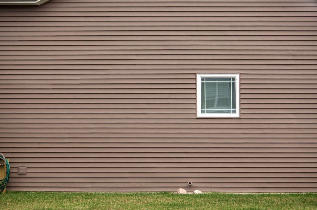 what is composite siding brown siding small square house