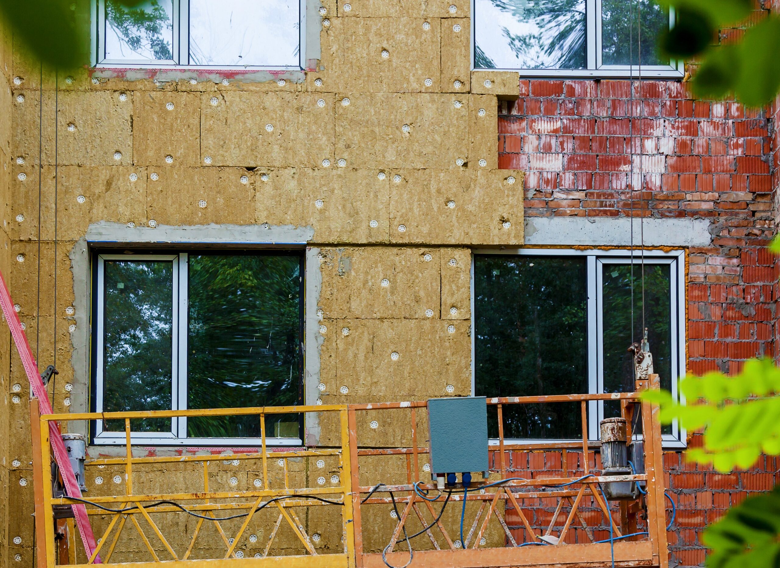 Preparation to install siding over brick
